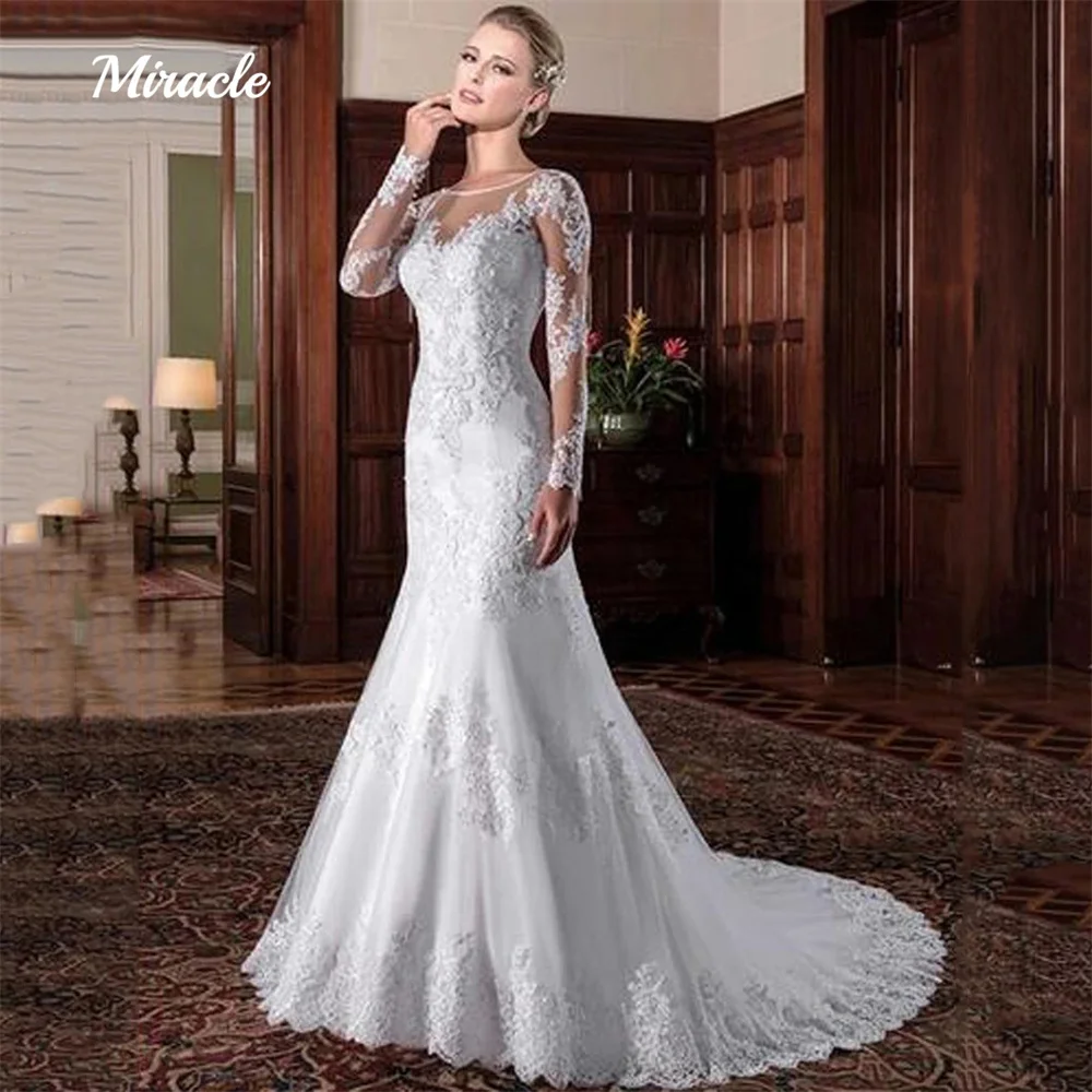 Wonderful Mermaid Wedding Dresses Scoop Neck Bride Robe Sexy Illusion Bridal Gown Long Sleeves Pearls Beading Vestidos De Novia 
Wonderful Mermaid Wedding Dresses Scoop Neck Bride Robe Sexy Illusion Bridal Gown Long Sleeves Pearls Beading Vestidos De Novia