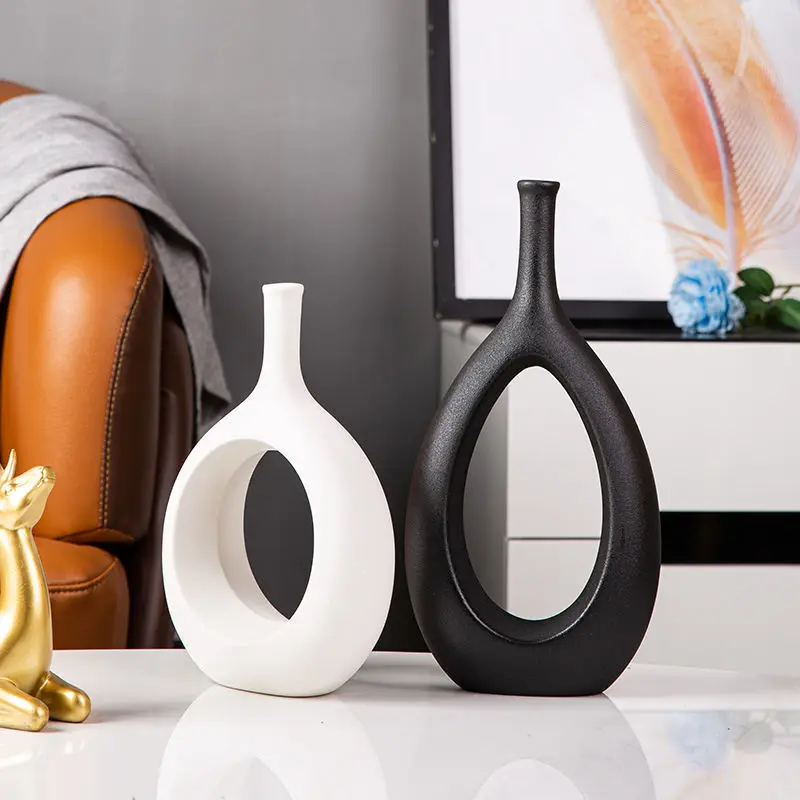 Nordic Circular Hollow Ceramic Vase Donuts Flower Pot Home Decoration Flower Vases Office Desktop Living Room Art Ornaments Gift
Nordic Circular Hollow Ceramic Vase Donuts Flower Pot Home Decoration Flower Vases Office Desktop Living Room Art Ornaments Gift