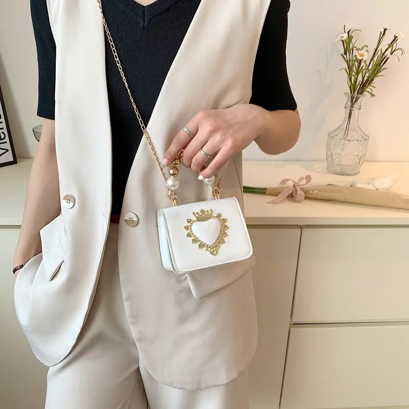 New pearl chain bag fashion solid color pu leather small messenger bag lipstick mini handbag banquet shoulder bag
New pearl chain bag fashion solid color pu leather small messenger bag lipstick mini handbag banquet shoulder bag