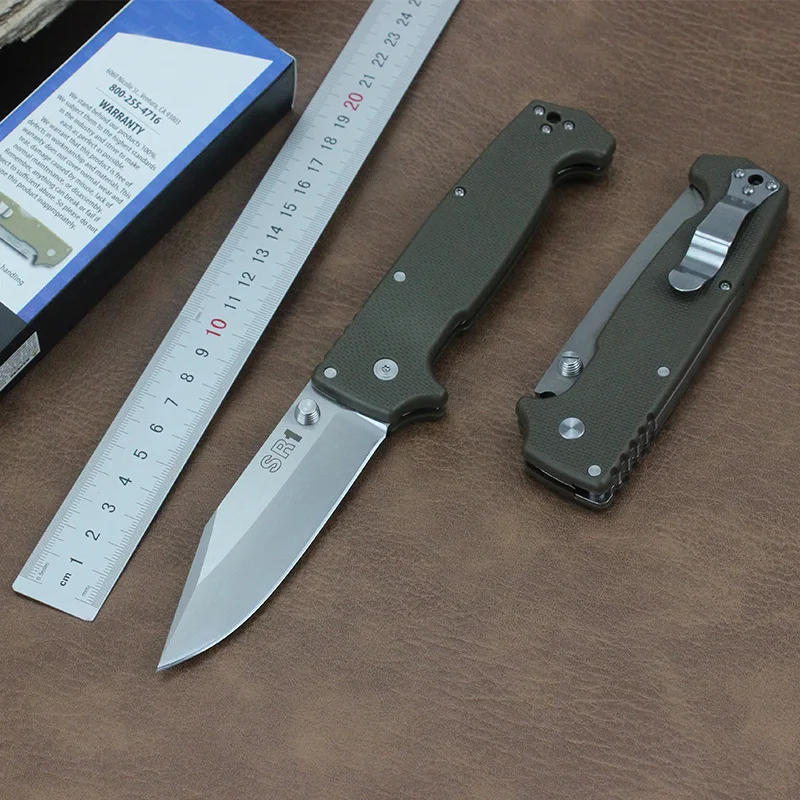 Складной карманный тактический нож Cold Steel SR1 для кемпинга на открытом воздухе, рукоятка, оборонительный разведчик, ножи для выживания, универсальные инструменты для повседневного использования
Складной карманный тактический нож Cold Steel SR1 для кемпинга на открытом воздухе, рукоятка, оборонительный разведчик, ножи для выживания, универсальные инструменты для повседневного использования