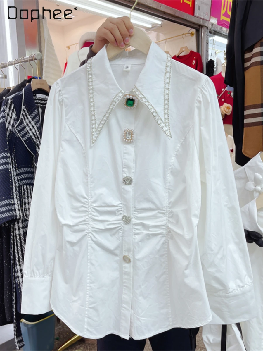 Heavy Industry Beads Diamond-Embedded White Women Shirt Autumn Doll Collar Pleated Waisted Long-Sleeved Trendy Blusas De Mujer
Heavy Industry Beads Diamond-Embedded White Women Shirt Autumn Doll Collar Pleated Waisted Long-Sleeved Trendy Blusas De Mujer