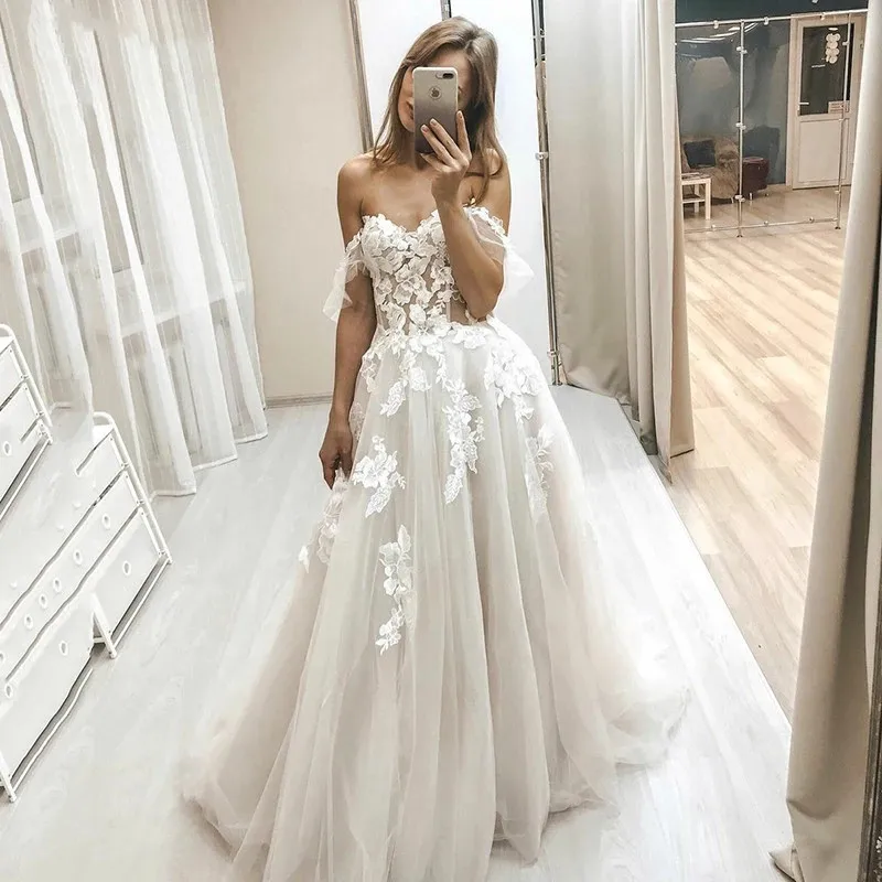 Ivory A line Boho Wedding Dress off The Shoulder Vintage Lace Appliques Bride Dresses Vestido De Novia Tulle Wedding Gown
Ivory A line Boho Wedding Dress off The Shoulder Vintage Lace Appliques Bride Dresses Vestido De Novia Tulle Wedding Gown