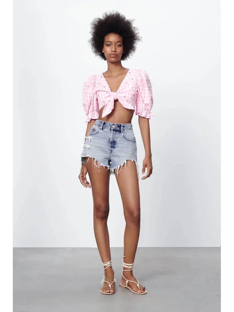2022 women's summer new handmade beaded small plaid short top European and American style backless puff sleeve T-shirt
2022 women's summer new handmade beaded small plaid short top European and American style backless puff sleeve T-shirt