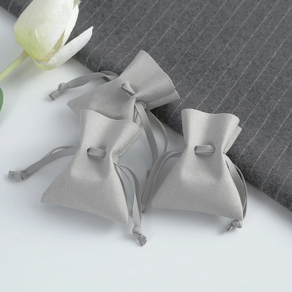 20 шт. горячая Распродажа барбекю древесный уголь упаковочные сумки Мини замша микрофибра ювелирные изделия кольца дисплей подарок сумка
20 шт. горячая Распродажа барбекю древесный уголь упаковочные сумки Мини замша микрофибра ювелирные изделия кольца дисплей подарок сумка