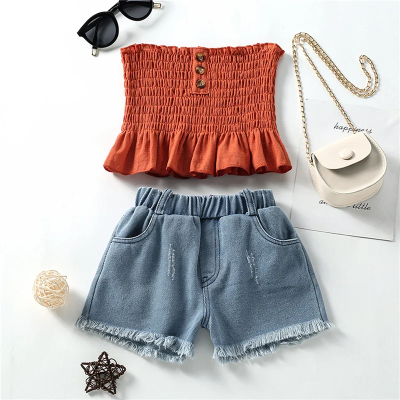 Stylish Kids Summer Solid Color Denim Shorts Outfits, Girls Smocked Ruffled Off Shoulder Tube Tops+Frayed Raw Hem Jeans 2-7Years
Stylish Kids Summer Solid Color Denim Shorts Outfits, Girls Smocked Ruffled Off Shoulder Tube Tops+Frayed Raw Hem Jeans 2-7Years