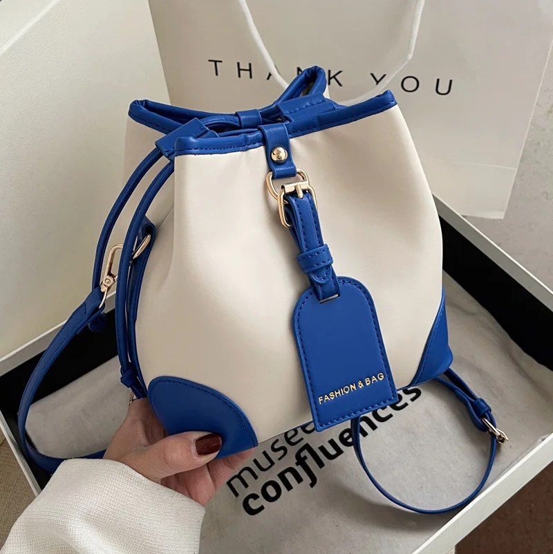 Luxury Leather Contrast Color Small Bag 2022 New Spring Simple Women's Bag Retro Shoulder Bag All-match Messenger Bucket Bag
Luxury Leather Contrast Color Small Bag 2022 New Spring Simple Women's Bag Retro Shoulder Bag All-match Messenger Bucket Bag
