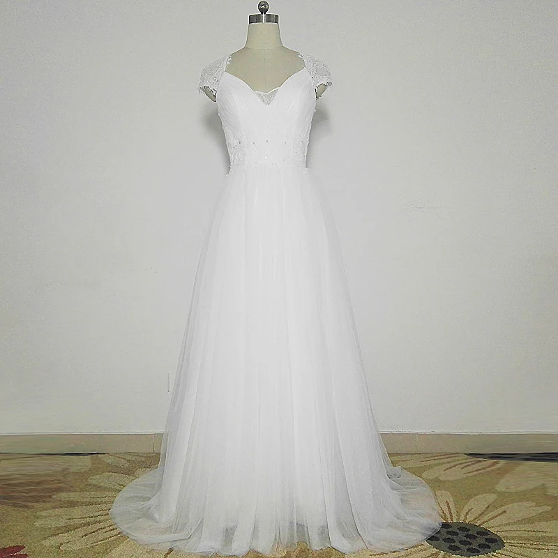 2022 Real Photo White Vintage Lace Beach Wedding Dresses V-neck Cap Sleeves Sheer Back Buttons Boho Bridal Dress robe de mariee
2022 Real Photo White Vintage Lace Beach Wedding Dresses V-neck Cap Sleeves Sheer Back Buttons Boho Bridal Dress robe de mariee