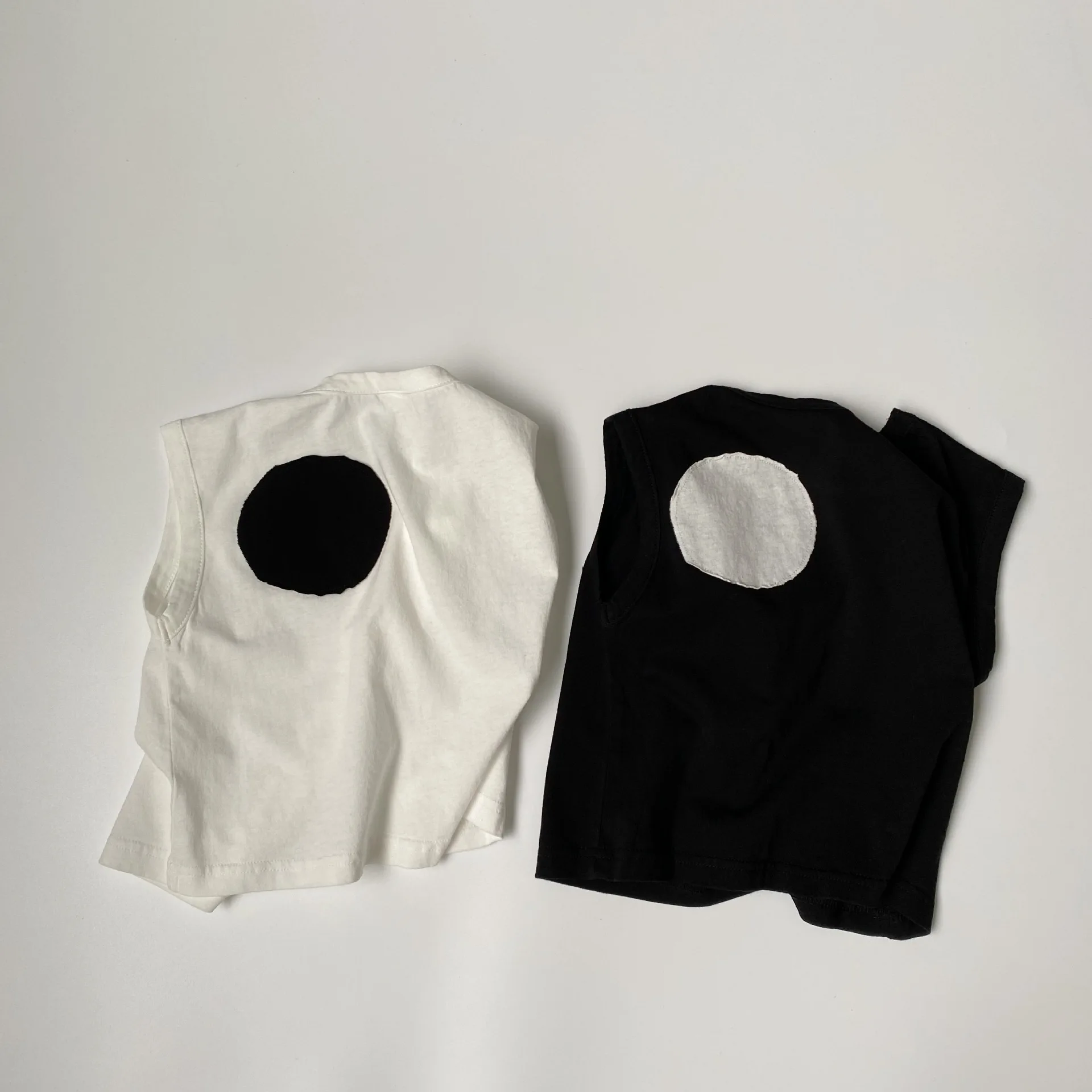 Детский хлопковый жилет с круглым вырезом, без рукавов
Детский хлопковый жилет с круглым вырезом, без рукавов