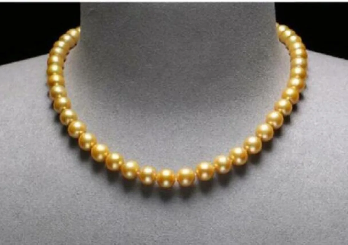 18 дюймов AAA + 8-9 мм натуральный круглый южнокитайский морской золотой жемчуг ожерелье с 14kp золотой пряжкой 
18 дюймов AAA + 8-9 мм натуральный круглый южнокитайский морской золотой жемчуг ожерелье с 14kp золотой пряжкой