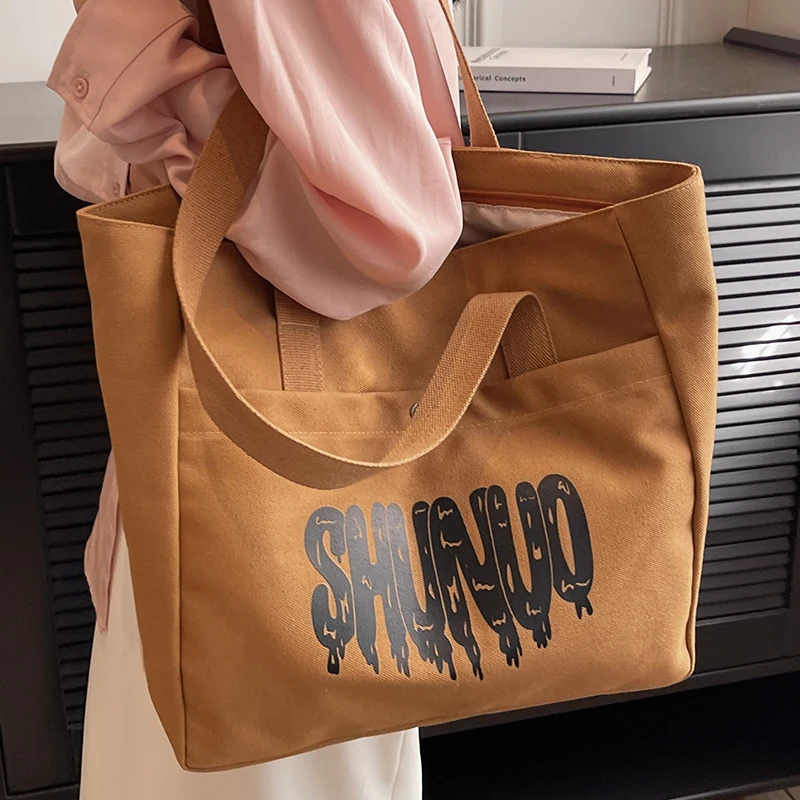 Brown Canvas Handbag for Women Eco-friendly Portable Lovers' Large Shopper Shoulder Bags Delicate Letter Print Female Tote Bags
Brown Canvas Handbag for Women Eco-friendly Portable Lovers' Large Shopper Shoulder Bags Delicate Letter Print Female Tote Bags