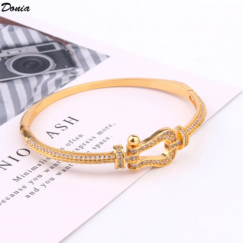 Donia jewelry New fashion horseshoe buckle micro-inlaid AAA zircon hollow bracelet luxury Joker women's luxury bracelet
Donia jewelry New fashion horseshoe buckle micro-inlaid AAA zircon hollow bracelet luxury Joker women's luxury bracelet