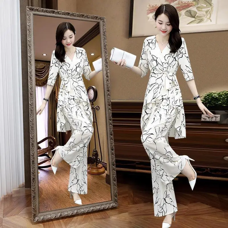 2022 New Fashion Slim Fit Wide Leg Pants Half Sleeves Navel V-neck Top Korean Print Women's Suit Casual Summer 2 Piece Set
2022 New Fashion Slim Fit Wide Leg Pants Half Sleeves Navel V-neck Top Korean Print Women's Suit Casual Summer 2 Piece Set