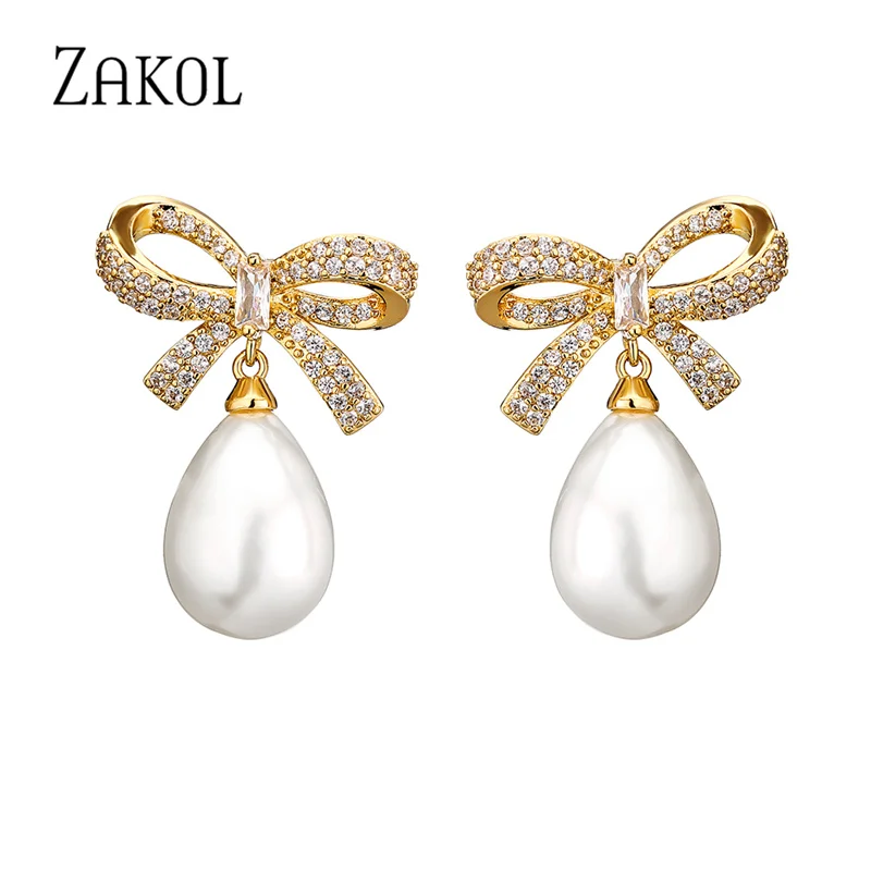 ZAKOL New Trendy Korean Micro Inlay CZ Zircon Bowknot Drop Earrings for Women Cute Imitation Pearls Wedding Jewelry EP1117
ZAKOL New Trendy Korean Micro Inlay CZ Zircon Bowknot Drop Earrings for Women Cute Imitation Pearls Wedding Jewelry EP1117