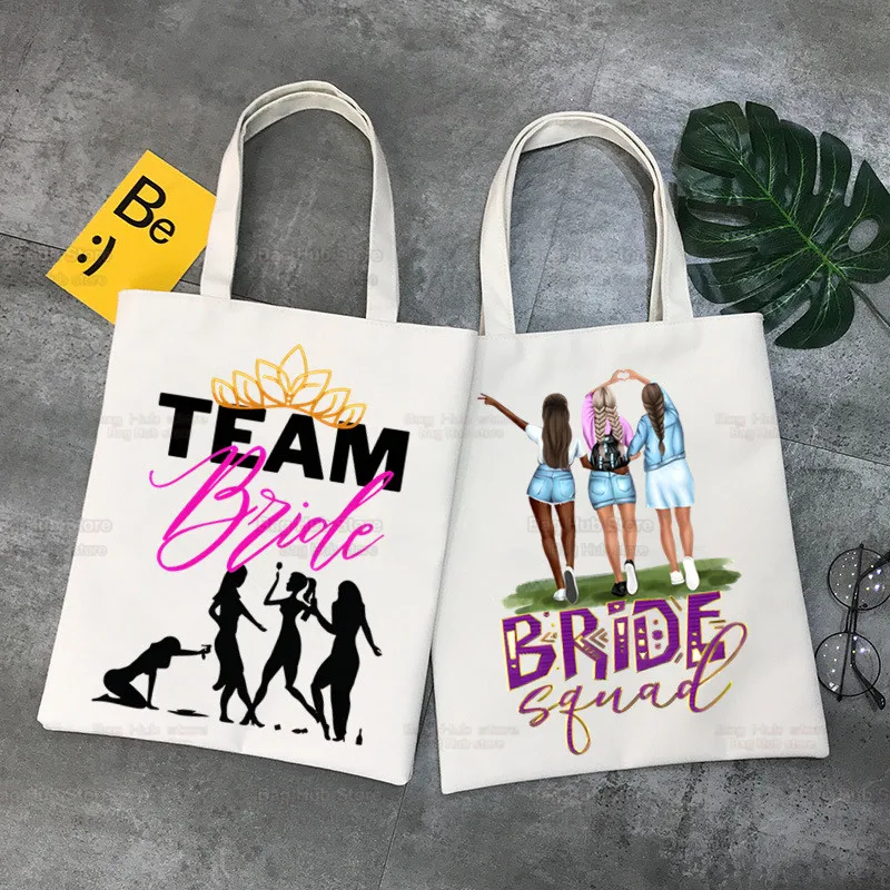 Team Bride Female Tote Bag Unisex Evjf Hen Party Canvas Bags Party Wedding Shopping Bags Casual Shoulder Bag Foldable
Team Bride Female Tote Bag Unisex Evjf Hen Party Canvas Bags Party Wedding Shopping Bags Casual Shoulder Bag Foldable
