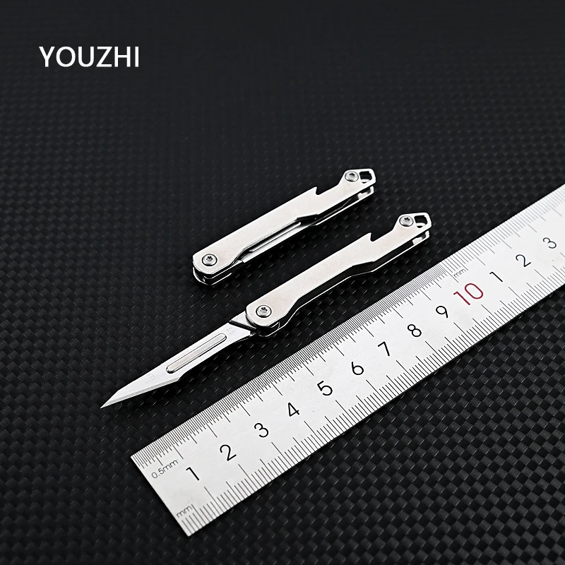Mini Stainless Steel Scalpel Folding Scalpel EDC Quick Open Emergency Medical Knife Keychain Unpacking Pocket Knife Box Cutter
Mini Stainless Steel Scalpel Folding Scalpel EDC Quick Open Emergency Medical Knife Keychain Unpacking Pocket Knife Box Cutter