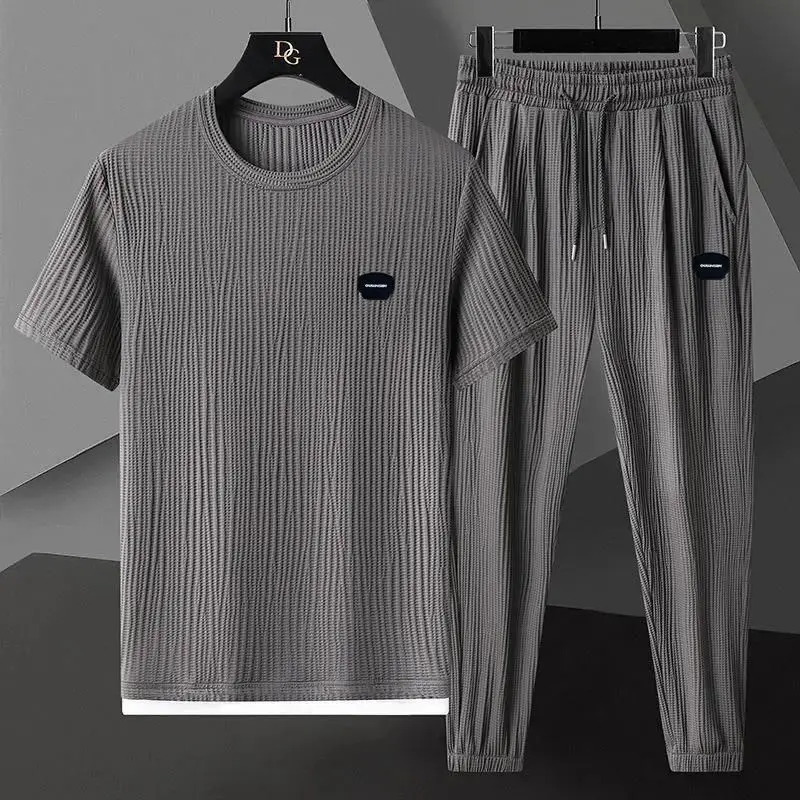 2023 summer high-end leisure sports suit cold breathable elastic quick drying short-sleeved trousers two-piece set size 4XL
2023 summer high-end leisure sports suit cold breathable elastic quick drying short-sleeved trousers two-piece set size 4XL