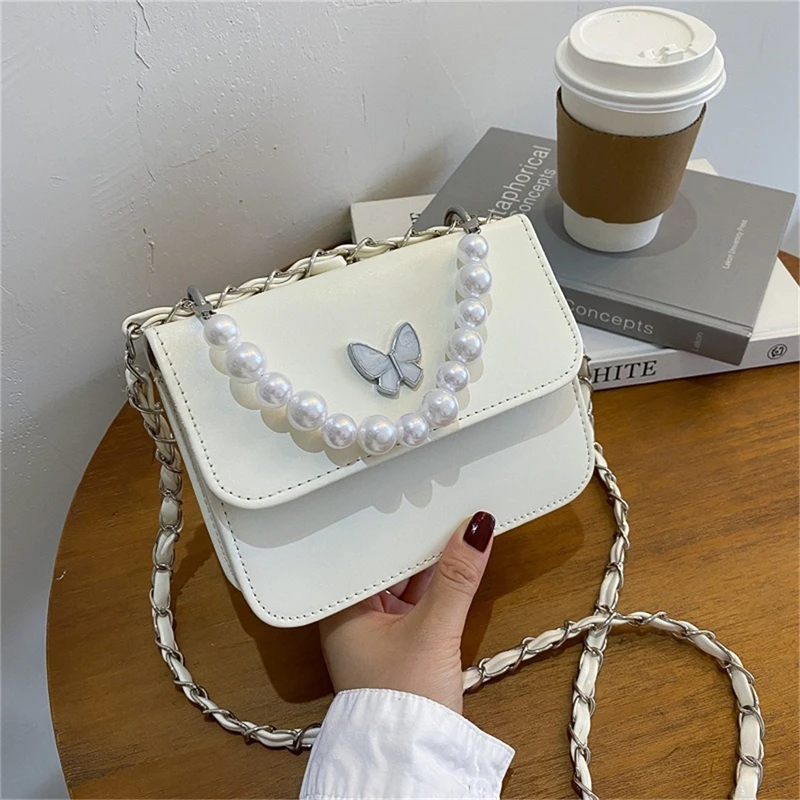 Fashion Solid Color PU Shoulder Bags Women Pearl Butterfly Handbags Totes Female Casual Travel Crossbody Sling Pouch
Fashion Solid Color PU Shoulder Bags Women Pearl Butterfly Handbags Totes Female Casual Travel Crossbody Sling Pouch
