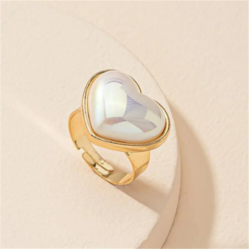 Simple Fashion Pearl Heart-shaped Open Ring Metal Gold Color Charming Women's Ring Romantic Wedding Jewelry Accessories 
Simple Fashion Pearl Heart-shaped Open Ring Metal Gold Color Charming Women's Ring Romantic Wedding Jewelry Accessories