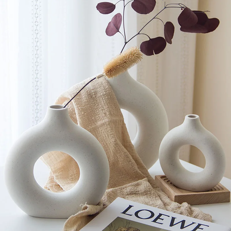 Black Circular Hollow Ceramic Vase Donuts Nordic Flower Pot Home Decoration Accessories Office Living Room Interior Decor
Black Circular Hollow Ceramic Vase Donuts Nordic Flower Pot Home Decoration Accessories Office Living Room Interior Decor