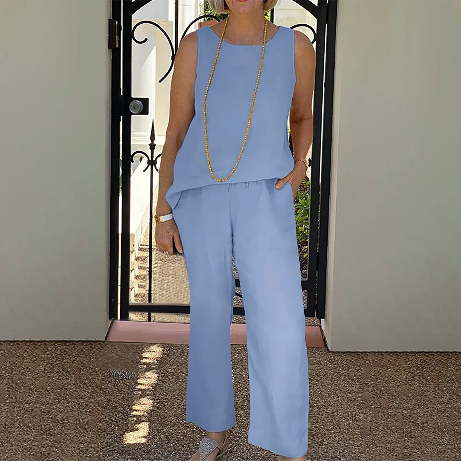 Женский Повседневный костюм из хлопка и льна, удобная рубашка без рукавов и длинные брюки, однотонный Элегантный женский богемный комплект
Женский Повседневный костюм из хлопка и льна, удобная рубашка без рукавов и длинные брюки, однотонный Элегантный женский богемный комплект