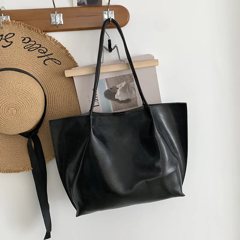 Simple big bag new big bag fashionable Pu soft leather portable big bag Single Shoulder Messenger women's bag
Simple big bag new big bag fashionable Pu soft leather portable big bag Single Shoulder Messenger women's bag