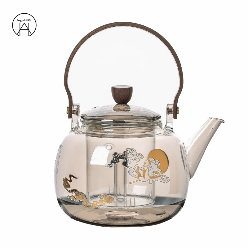 High-end Tea set Gold silver tea colored glass teapot Wooden carrying handle Transparent boiling teapot Steam boil 2 inner pots
High-end Tea set Gold silver tea colored glass teapot Wooden carrying handle Transparent boiling teapot Steam boil 2 inner pots
