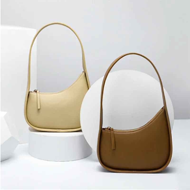 First Layer Cowhide New Leather Moon-shaped Ladies Handbag Top Underarm Mini Bag
First Layer Cowhide New Leather Moon-shaped Ladies Handbag Top Underarm Mini Bag
