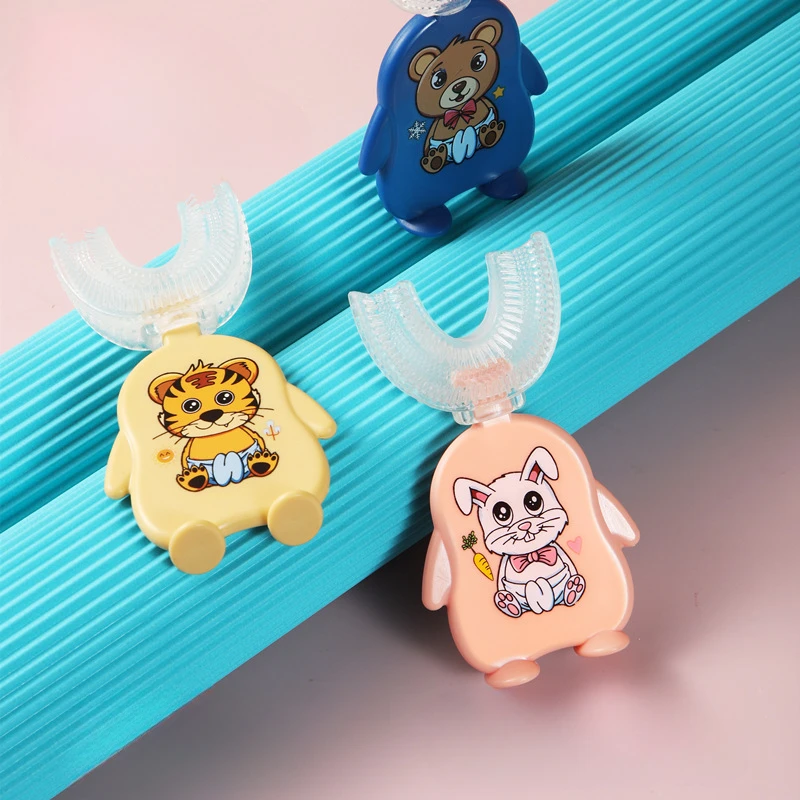 New manual children's U-shaped toothbrush baby 2-12 years old students clean teeth brushing artifact baby toothbrush
New manual children's U-shaped toothbrush baby 2-12 years old students clean teeth brushing artifact baby toothbrush