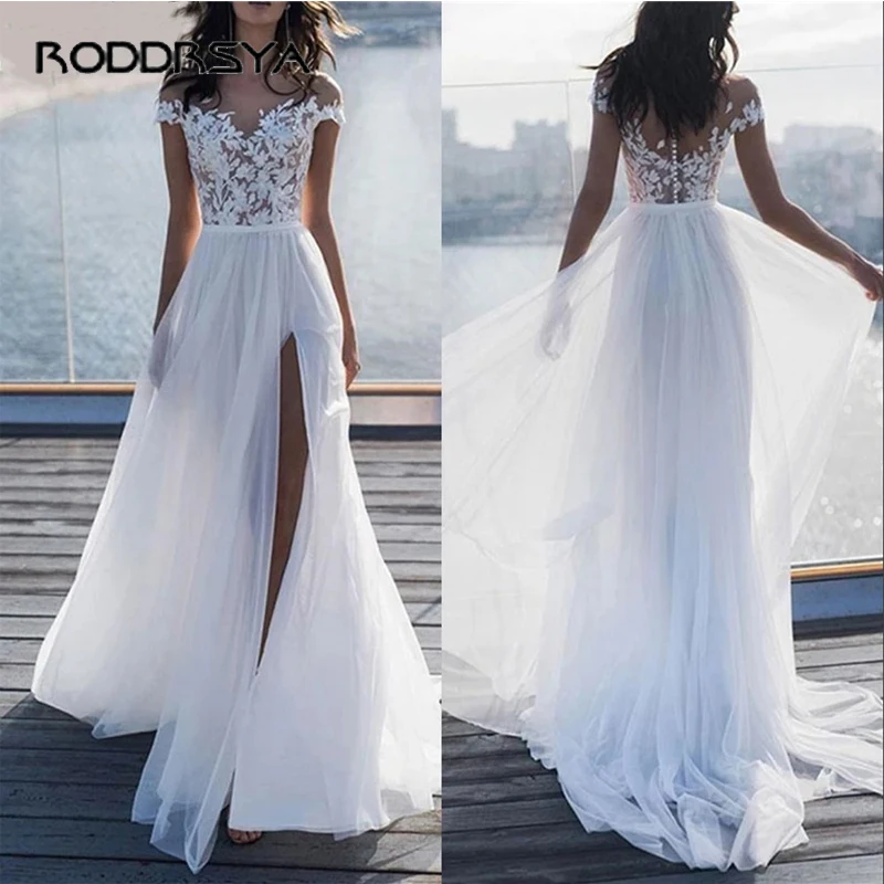 Пляжное Тюлевое свадебное платье с открытыми плечами, элегантное ТРАПЕЦИЕВИДНОЕ ПЛАТЬЕ С V-образным вырезом, разрезом сбоку, кружевом, блес...
Пляжное Тюлевое свадебное платье с открытыми плечами, элегантное ТРАПЕЦИЕВИДНОЕ ПЛАТЬЕ С V-образным вырезом, разрезом сбоку, кружевом, блес...