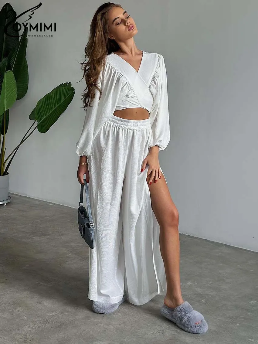 Oymimi Fashion White Womens 2 Piece Outfit Set Casual New V-Neck Wrist Sleeve Crop Tops And High Waisted Side Slit Trousers Sets
Oymimi Fashion White Womens 2 Piece Outfit Set Casual New V-Neck Wrist Sleeve Crop Tops And High Waisted Side Slit Trousers Sets