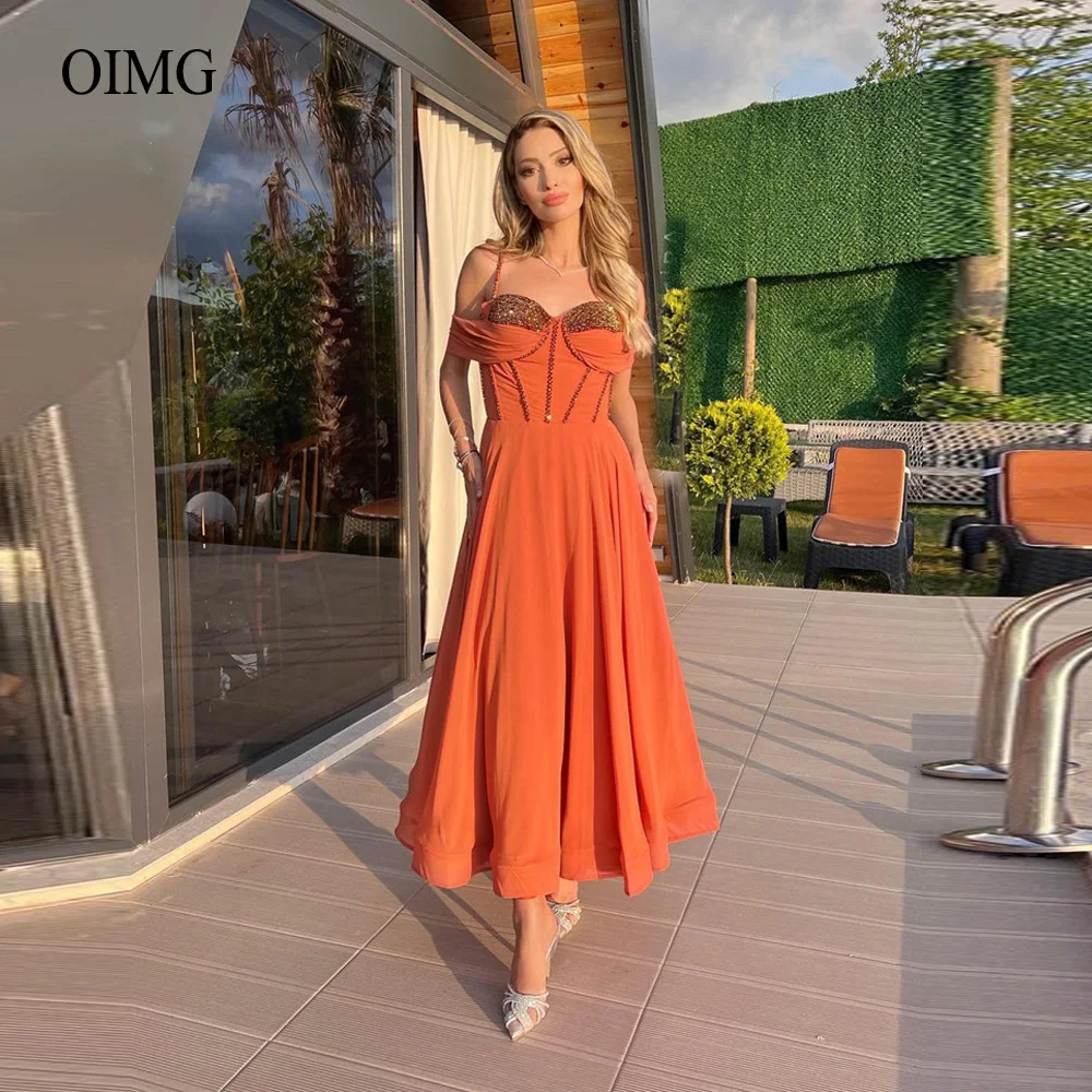 OIMG A Line Chiffon Prom Dresse Spaghetti Straps Beads Sweetheart Midi Length Party Gowns For Teens Lace Up Back Robe de soiree
OIMG A Line Chiffon Prom Dresse Spaghetti Straps Beads Sweetheart Midi Length Party Gowns For Teens Lace Up Back Robe de soiree