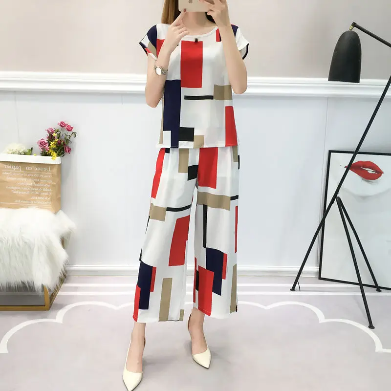 Ladies Summer Suit Fashion Short Sleeve Chiffon Top Casual Ninth Pants Suit Fat MM Striped Loose Casual Fashion Two Piece Set
Ladies Summer Suit Fashion Short Sleeve Chiffon Top Casual Ninth Pants Suit Fat MM Striped Loose Casual Fashion Two Piece Set
