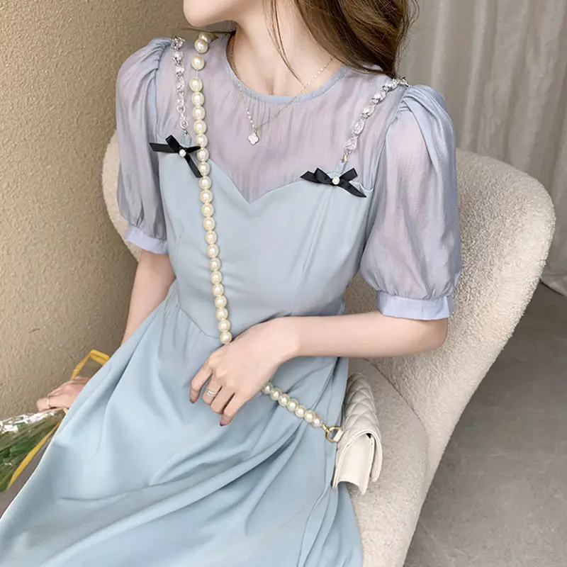 Summer Fashion NewStyle Stitching Chiffon Bow Mid-length High-end Blue Women's Dress with Puff Sleeves SlightlyTransparent Waist
Summer Fashion NewStyle Stitching Chiffon Bow Mid-length High-end Blue Women's Dress with Puff Sleeves SlightlyTransparent Waist