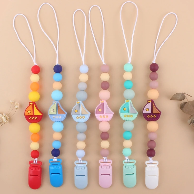 Creative Cartoon Sailing Boat Baby Silicone Beads Pacifier Clip Infant Toddler Teething Chewable Soothie Teether Chain
Creative Cartoon Sailing Boat Baby Silicone Beads Pacifier Clip Infant Toddler Teething Chewable Soothie Teether Chain