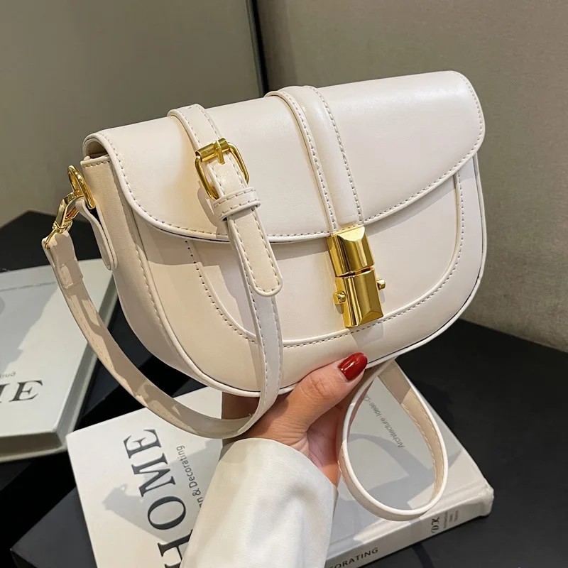 Женская новая однотонная модная сумка через плечо, повседневная простая седельная сумка, универсальные дизайнерские женские сумки 
Женская новая однотонная модная сумка через плечо, повседневная простая седельная сумка, универсальные дизайнерские женские сумки