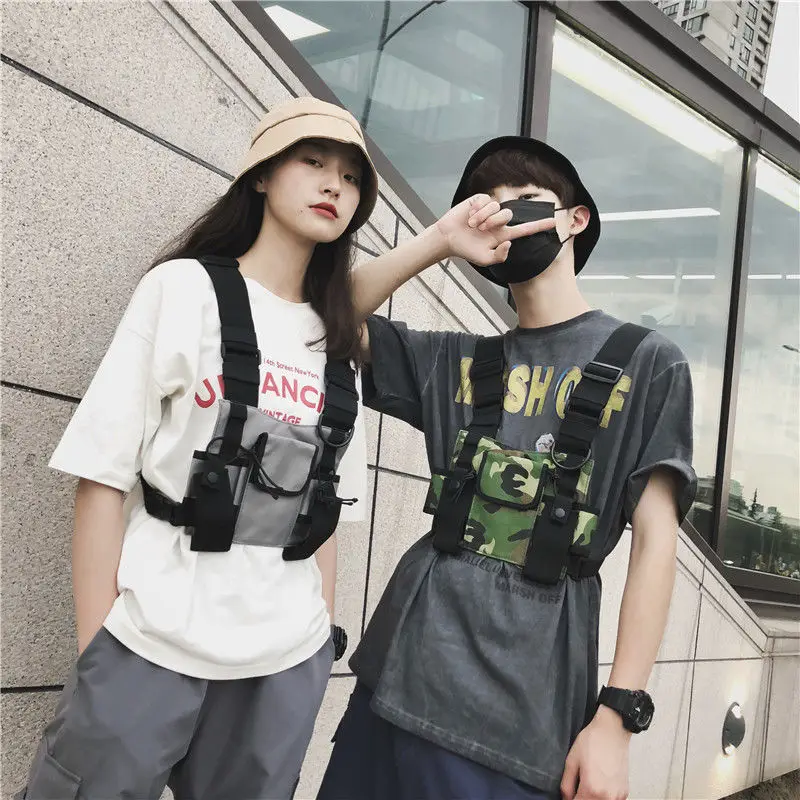 Fashion Female Hip-hop Tactical Street Style Chest Bag Unisex Adjustable Multi Pocket Sports Vest Bags Trendy Chest Rig Pack
Fashion Female Hip-hop Tactical Street Style Chest Bag Unisex Adjustable Multi Pocket Sports Vest Bags Trendy Chest Rig Pack