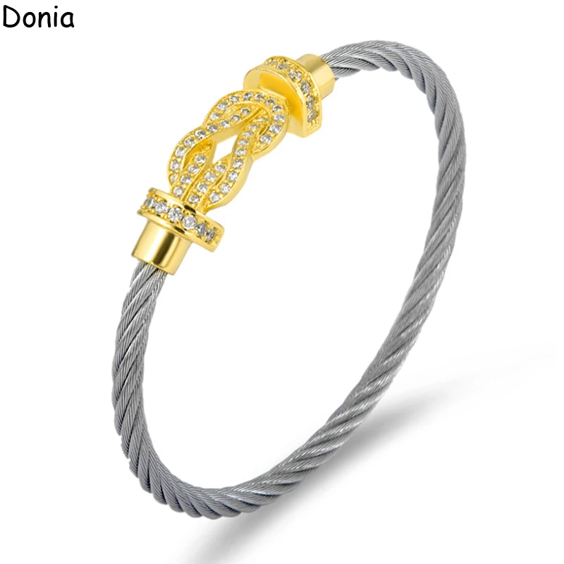 Donia jewelry European and American fashion cross horseshoe magnetic buckle titanium steel rope U-shaped luxury bracelet
Donia jewelry European and American fashion cross horseshoe magnetic buckle titanium steel rope U-shaped luxury bracelet