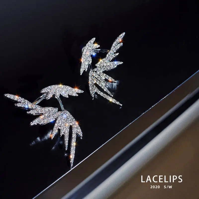 Женские серьги в виде крыльев из циркония в стиле панк
Женские серьги в виде крыльев из циркония в стиле панк