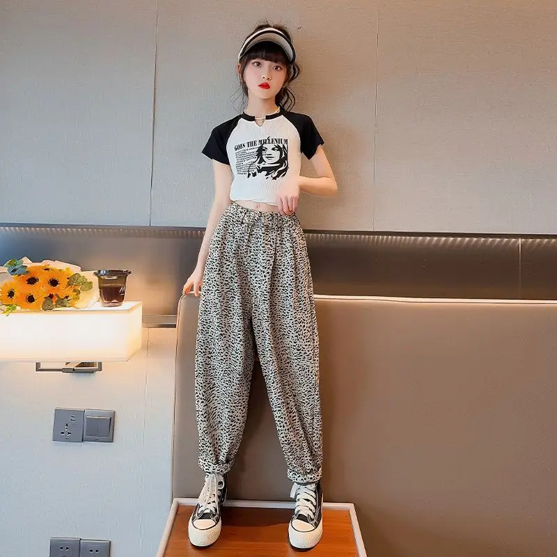 Футболка с коротким рукавом и брюки с широкими штанинами для девочек 5-14 лет
Футболка с коротким рукавом и брюки с широкими штанинами для девочек 5-14 лет