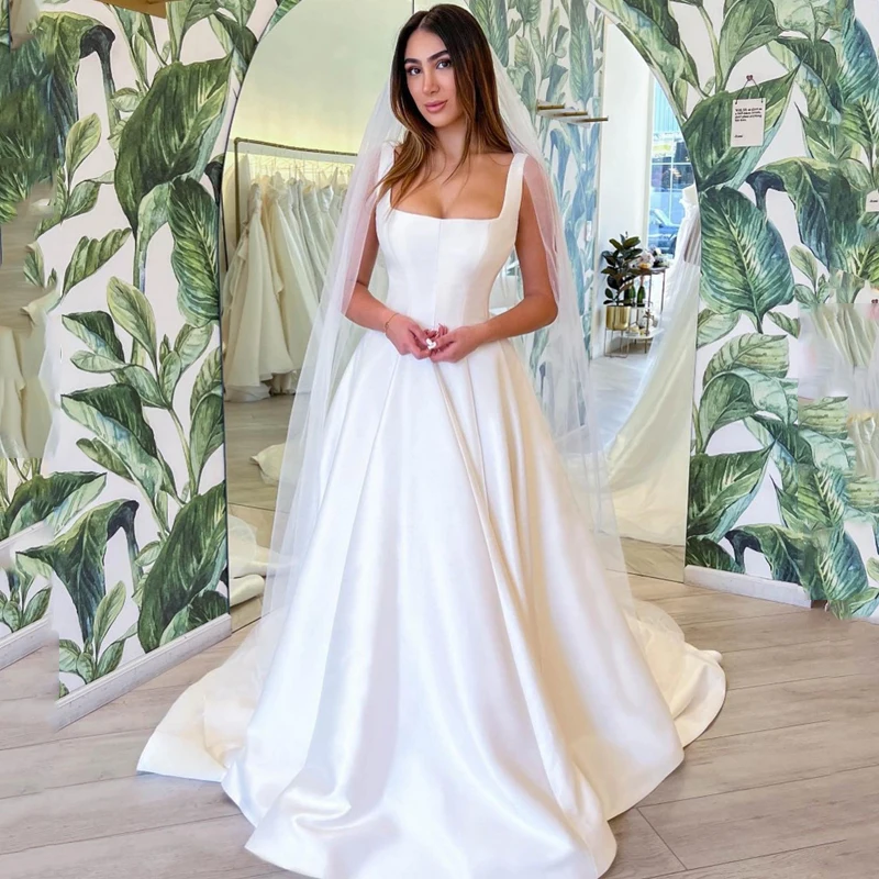 Привлекательные вечерние платья-трапеции для выпускного вечера, белое официальное платье в пол без рукавов с квадратным вырезом и карманами, 2023
Привлекательные вечерние платья-трапеции для выпускного вечера, белое официальное платье в пол без рукавов с квадратным вырезом и карманами, 2023