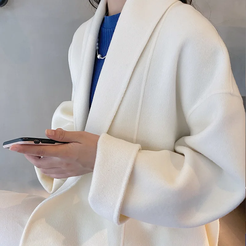 Autumn/Winter New Double-sided Cashmere Women Coat Nightgown Style Elegant Fashion Belt Lapel Tweed Jacket High Quality Tops
Autumn/Winter New Double-sided Cashmere Women Coat Nightgown Style Elegant Fashion Belt Lapel Tweed Jacket High Quality Tops