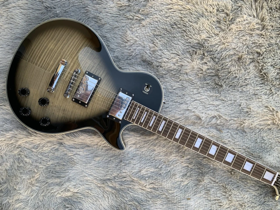 In stock blue circle LP Custom Electric Guitar,mahogany wood body and neck High Quality Pickups and Bright Paint Surface
In stock blue circle LP Custom Electric Guitar,mahogany wood body and neck High Quality Pickups and Bright Paint Surface