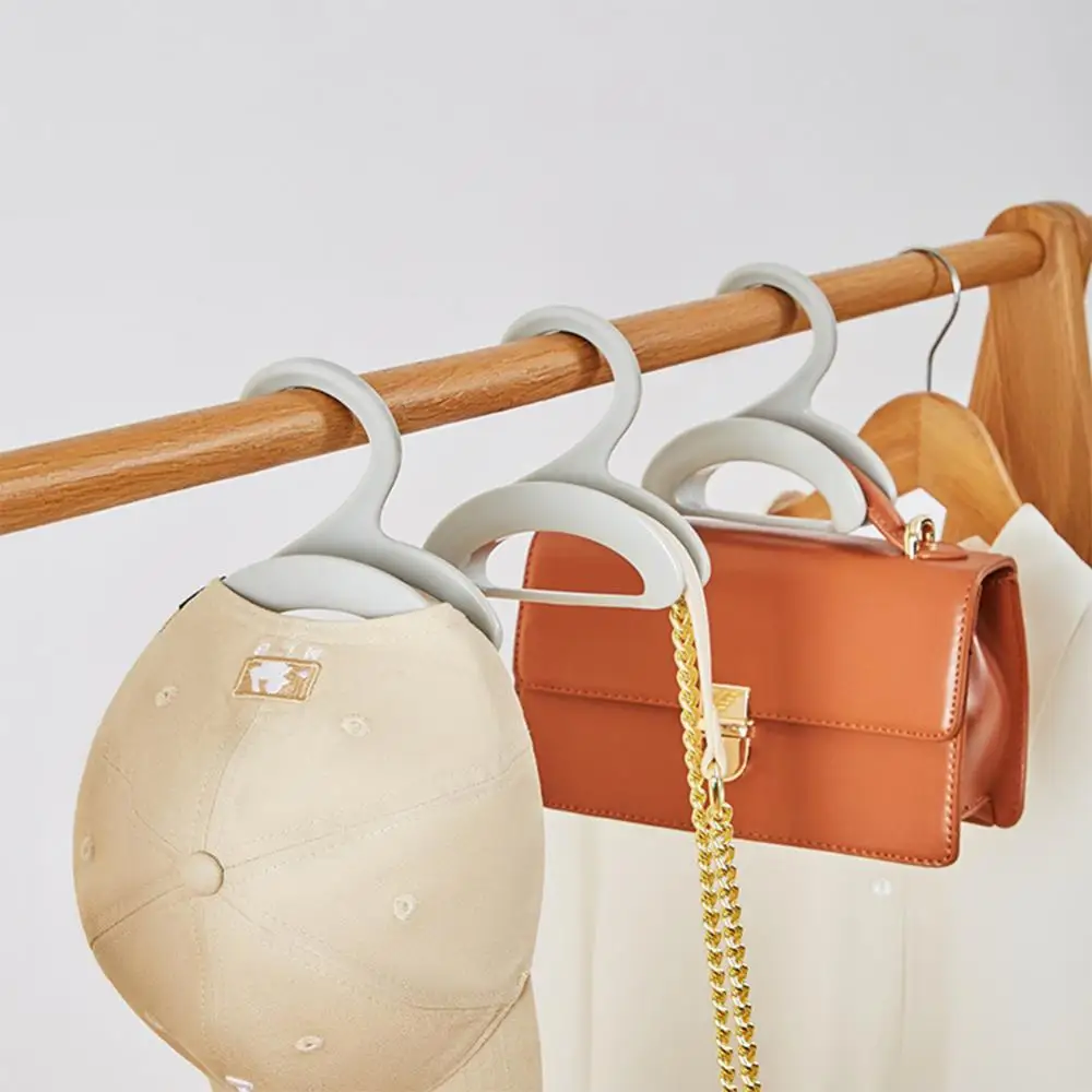 1Pcs New Plastic Simple Bow Shape Hook Wardrobe Handbag Hanger Bag Organizer Multifunction Storage Rack Household Hanging Hook
1Pcs New Plastic Simple Bow Shape Hook Wardrobe Handbag Hanger Bag Organizer Multifunction Storage Rack Household Hanging Hook