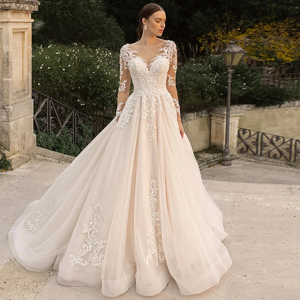 Boho Lace Tulle Wedding Dress Princess Champagne A-Line V-Neck Long Sleeves Appliques Illusion Backless With Button Bridal Gown
Boho Lace Tulle Wedding Dress Princess Champagne A-Line V-Neck Long Sleeves Appliques Illusion Backless With Button Bridal Gown