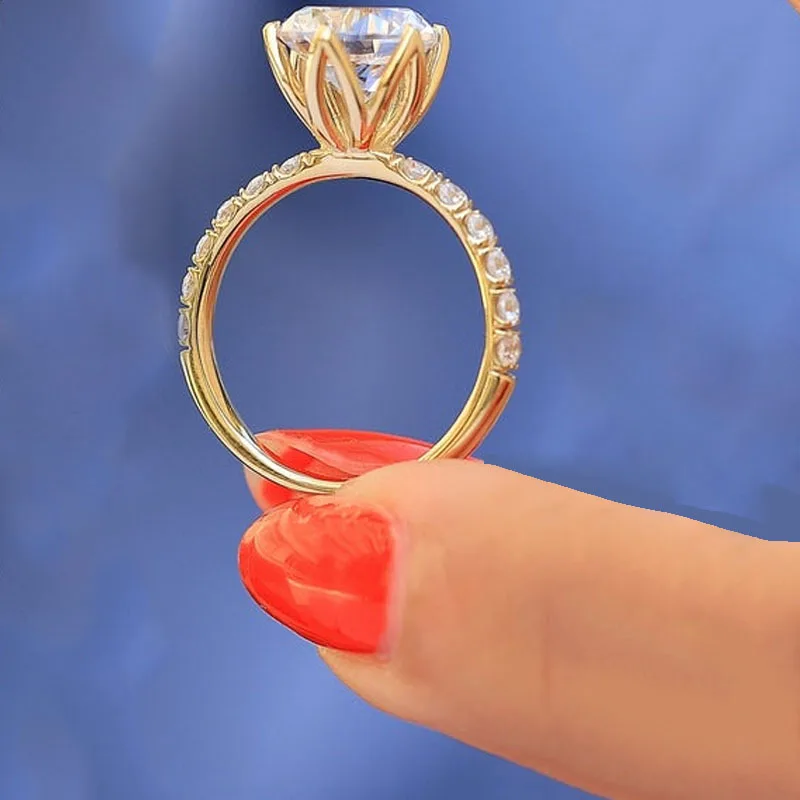 European and American Style Simple Women's Wedding Engagement Ring Gold Inlaid Round White Crystal Rhinestone Ring Jewelry
European and American Style Simple Women's Wedding Engagement Ring Gold Inlaid Round White Crystal Rhinestone Ring Jewelry
