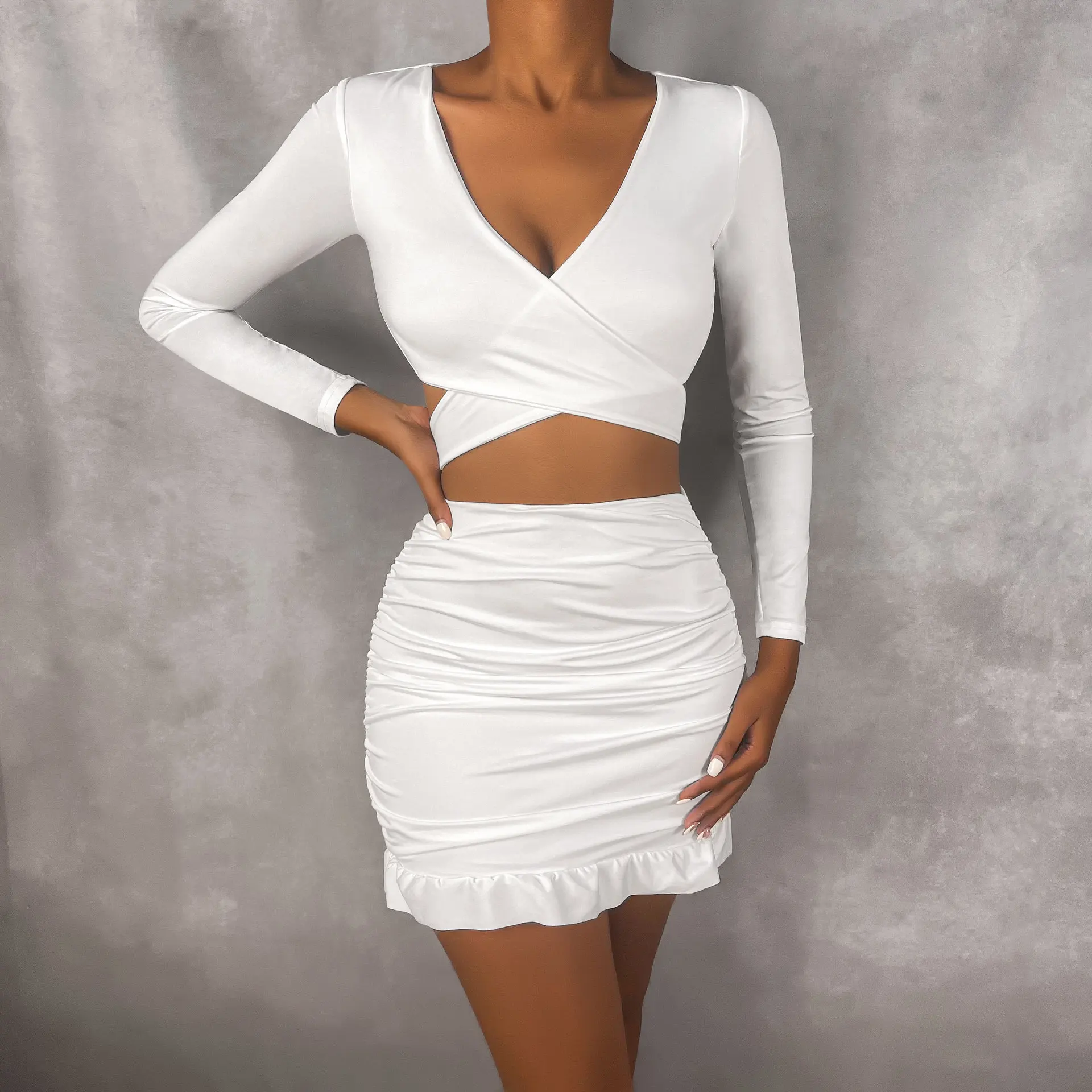 Women's two-piece suit long-sleeved sexy low-cut lace-up short skirt with ruffles and buttocks skirt
Women's two-piece suit long-sleeved sexy low-cut lace-up short skirt with ruffles and buttocks skirt