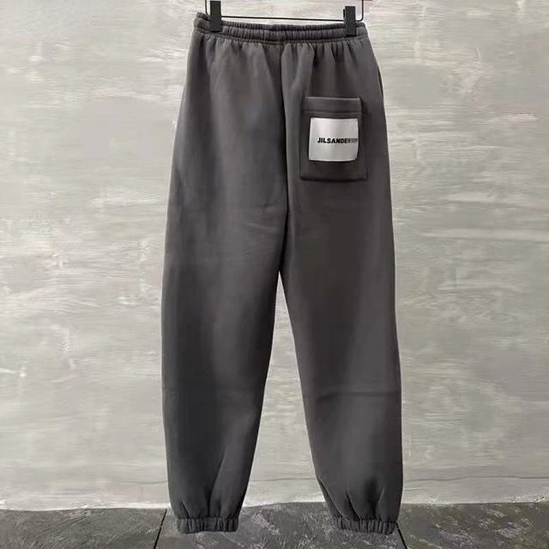 JIL SANDE Sweatpants Gray Big Label Logo Leggings Pants Men Loose Sports Pants 2021 Winter Casual Jogging Pants
JIL SANDE Sweatpants Gray Big Label Logo Leggings Pants Men Loose Sports Pants 2021 Winter Casual Jogging Pants