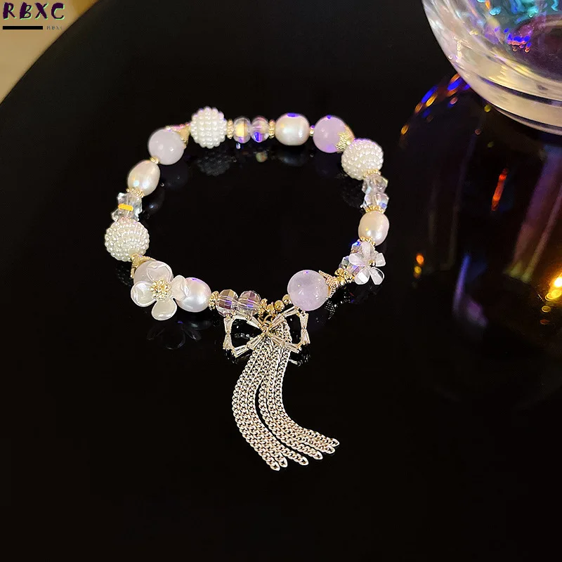RBXC Korean New Copper Plated Pearl Tassel Zircon Bow Bracelet Women's Pearl Cat's Eye Stone Bracelet
RBXC Korean New Copper Plated Pearl Tassel Zircon Bow Bracelet Women's Pearl Cat's Eye Stone Bracelet