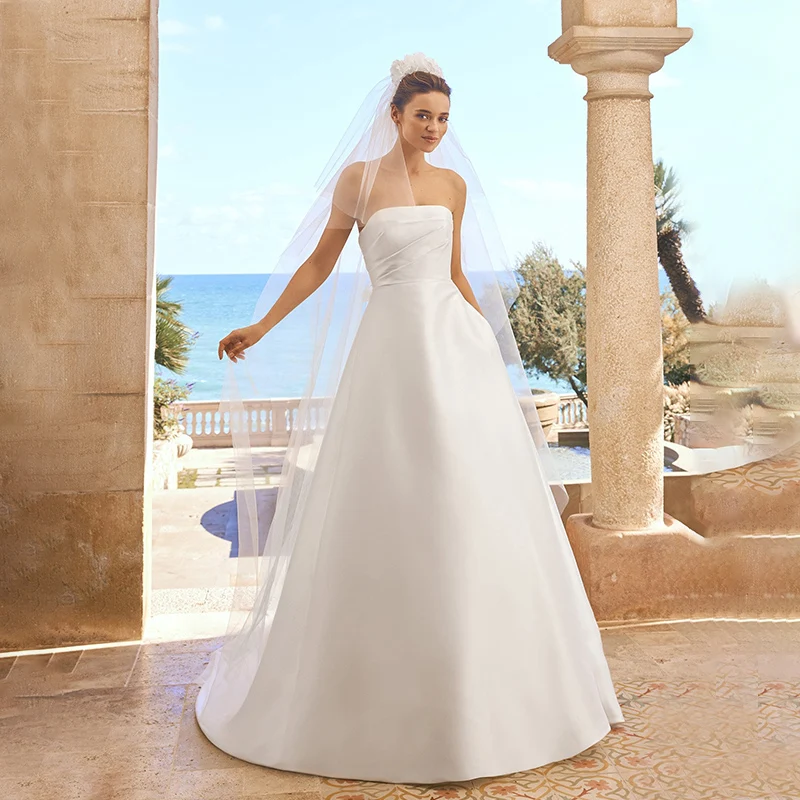 High Quality Strapless Princess Pockets A-Line Wedding Dresses Sleeveless Satin Bride Gown Customize Made
High Quality Strapless Princess Pockets A-Line Wedding Dresses Sleeveless Satin Bride Gown Customize Made