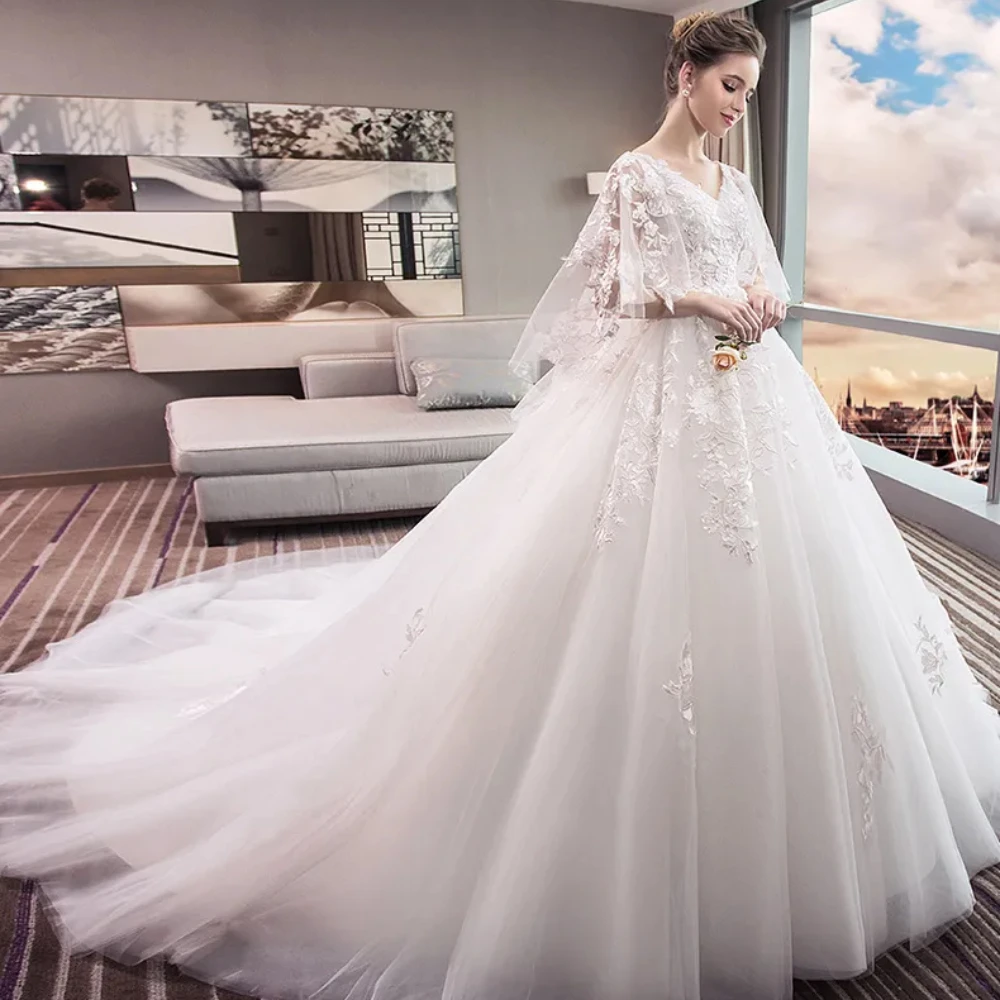 New Exquisite Wedding Dresses V-Neck Ball Gowns Bridal Dress Luxury Fashion Appliques Lace Up Back Long Sleeves Vestido De Novia
New Exquisite Wedding Dresses V-Neck Ball Gowns Bridal Dress Luxury Fashion Appliques Lace Up Back Long Sleeves Vestido De Novia